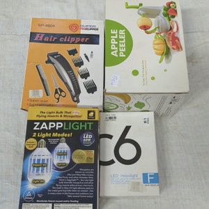 Cuatro piezas: pelador de fruta, lamparas de auto, lampara mata insectos y cortadora de cabello. - imagen 2