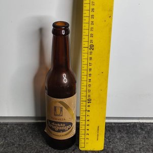 Lote anterior: Botella de Cerveza Doble Uruguaya Antigua