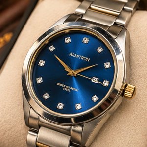 Reloj Armitron Elegante Esfera Azul Zafiro con Índices Brillantes y Detalles Dorados - imagen 3