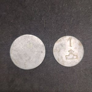 Lote siguiente: Dos Fichas Metálicas Circulares