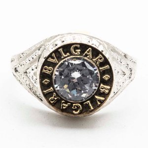 Lote siguiente: Anillo de Plata con Oro y Piedra Central