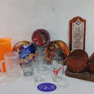 Lote anterior: Juego de Vasos, Latas Decorativas y Jarra Naranja