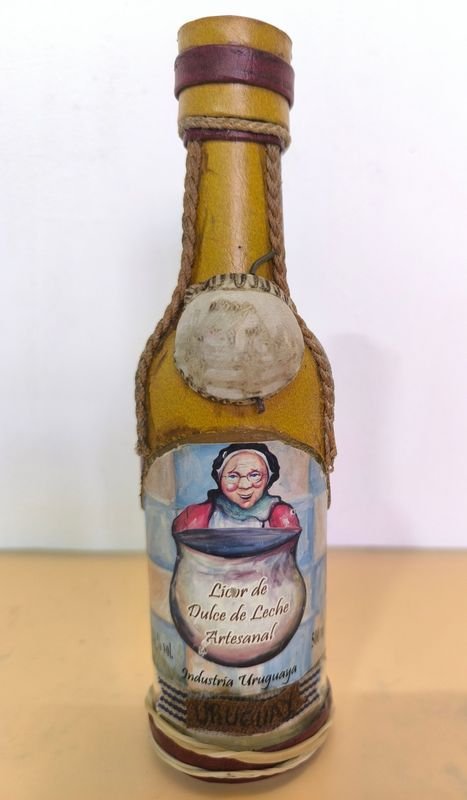 BOTELLA VINTAGE DE LICOR DE DULCE DE LECHE FORRADA - imagen 3