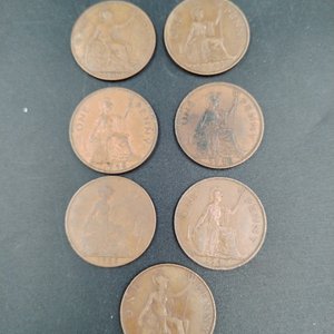 Lote siguiente: 7 Monedas One Penny Reino Unido - Colección Real