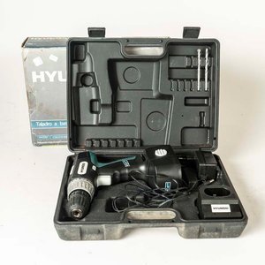 Lote siguiente: Taladro a Batería Hyundai con Accesorios