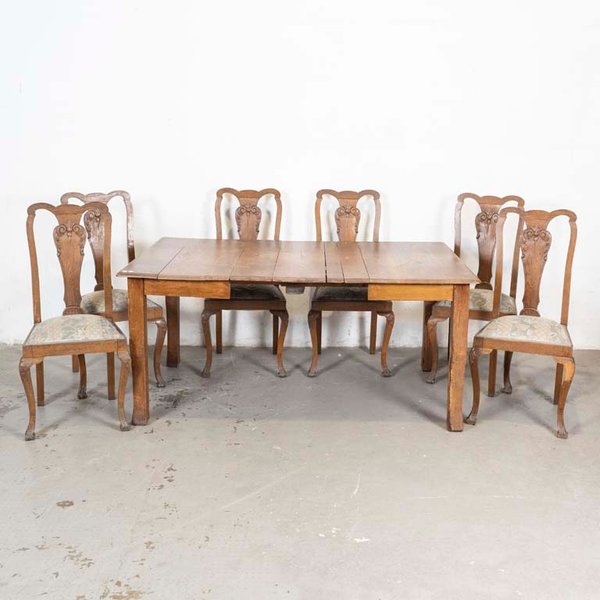 Mesa de comedor y sillas de roble con detalles en el lustre - imagen 1