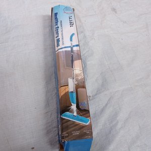 Tres piezas: organizador de ropa, mopa con spray y limpiador giratorio. - imagen 4