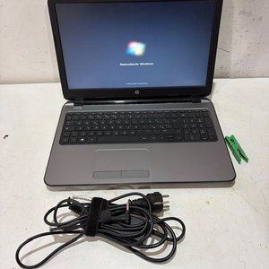 Lote siguiente: Notebook HP Funcionando con Cargador