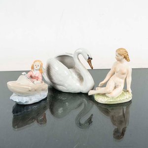 Lote anterior: Lote de 3 Figuras de Porcelana: Cisne y Dos Figuras Femeninas