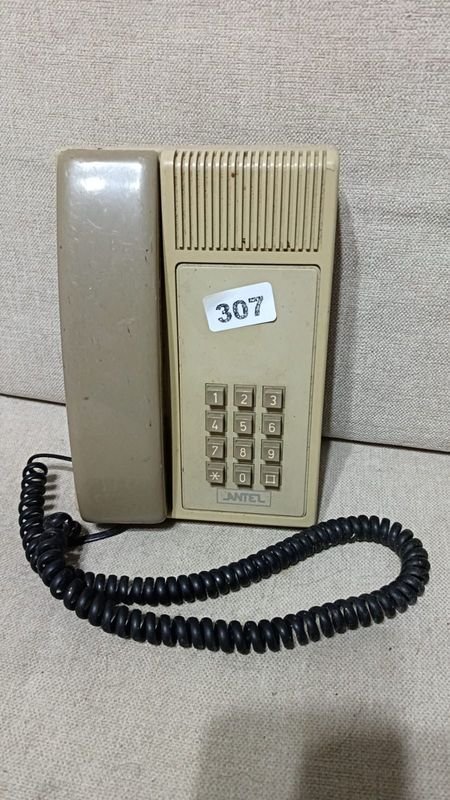 Teléfono Fijo Beige Antel con Teclado y Cable Espiral