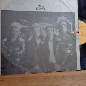 Lote anterior: 181) Disco LP ( Queen) The Game  Industria Uruguaya  1979 Detalle en Cubierta