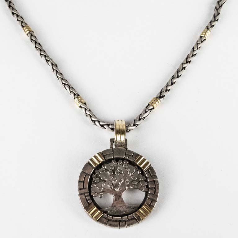 Lote anterior: Cadena de plata y oro con dije de diseño de árbol