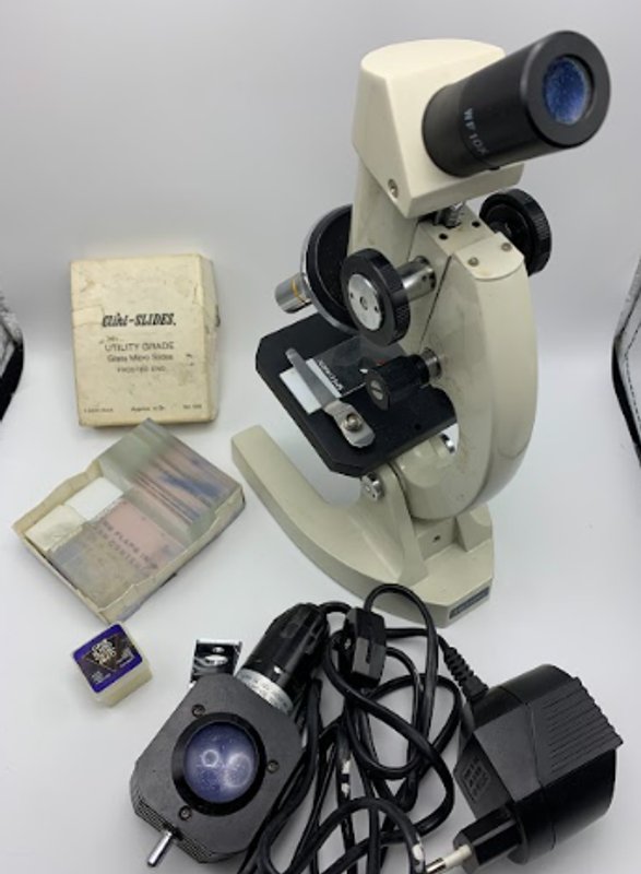 Microscopio binocular con lentes ajustables - imagen 1