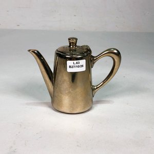 Lote siguiente: Tetera Antigua de Metal Plateado con Marca Grabada