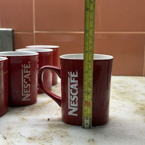 Conjunto de 14 Tazas Cerámicas: Nescafé, Coca-Cola y Diseños Festivos - imagen 15
