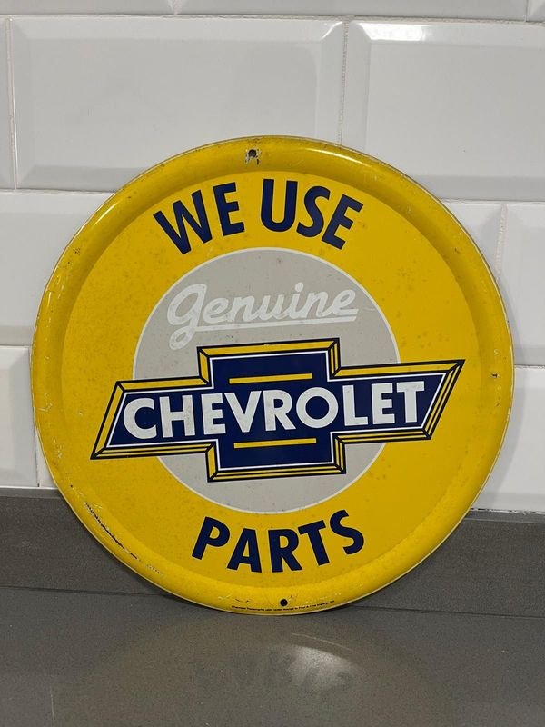 Chapa Decorativa Chevrolet "Genuine Parts" Redonda