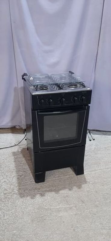 Cocina a Gas James Negra 4 Hornallas con Horno