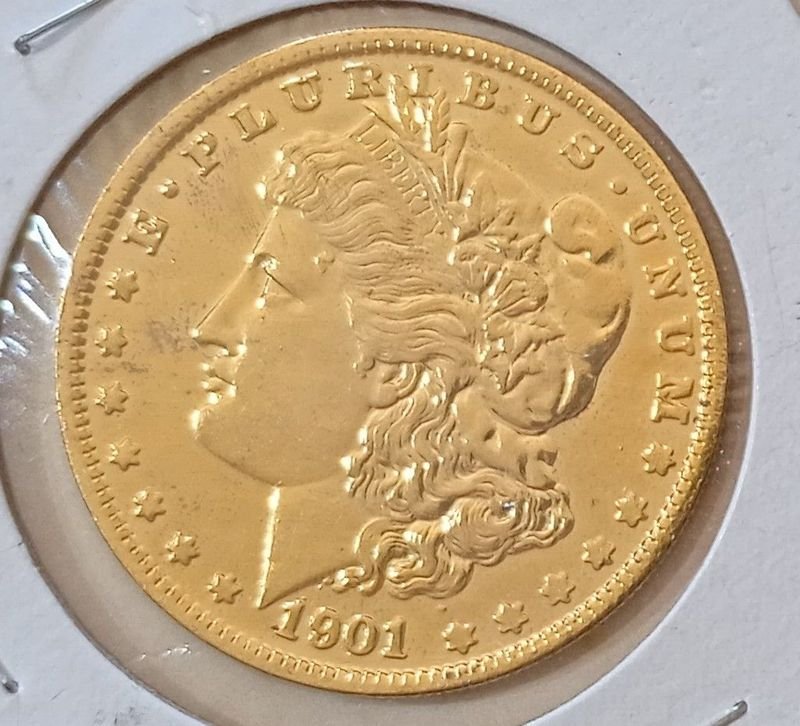 Lote anterior: Réplica de un dólar Morgan de 1901 enchapada - Oro en forma de moneda