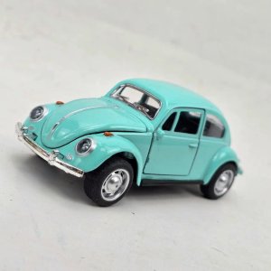 Lote siguiente: Auto a Escala Metálico Volkswagen Escarabajo Celeste