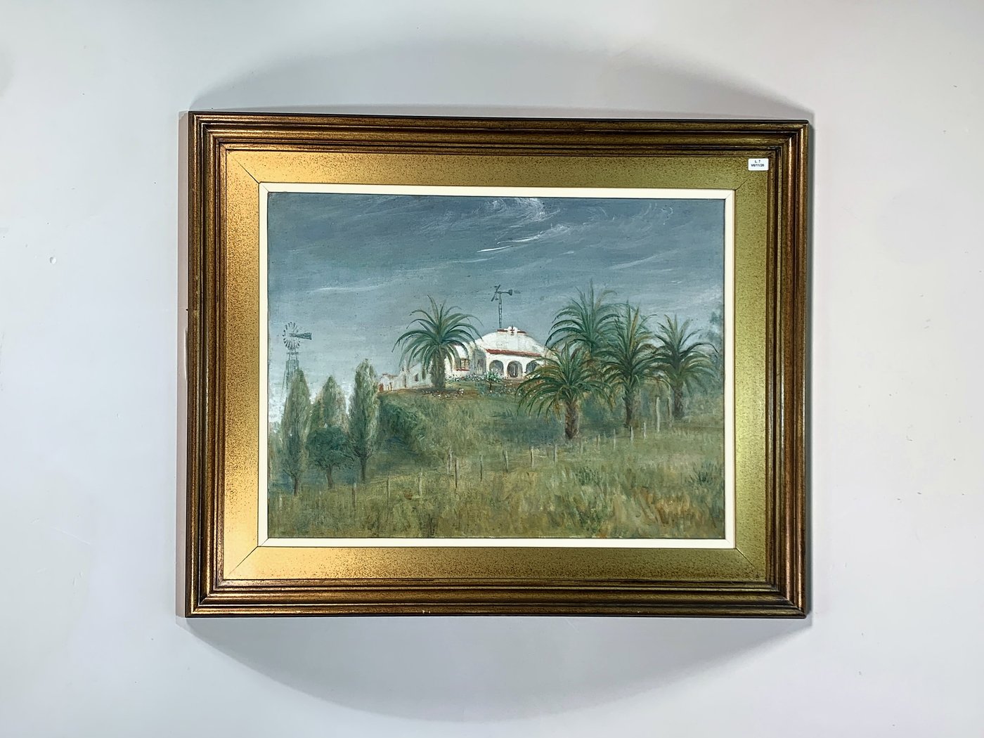 Cuadro al óleo: Casco de estancia con molinos y palmeras