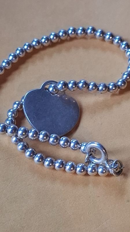 Pulsera de plata con corazón