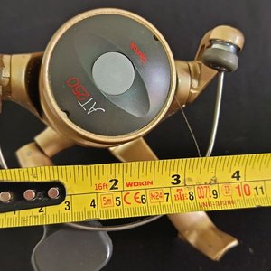 Reel de Pesca Quick AT250 Dorado con Carrete Adicional - imagen 9