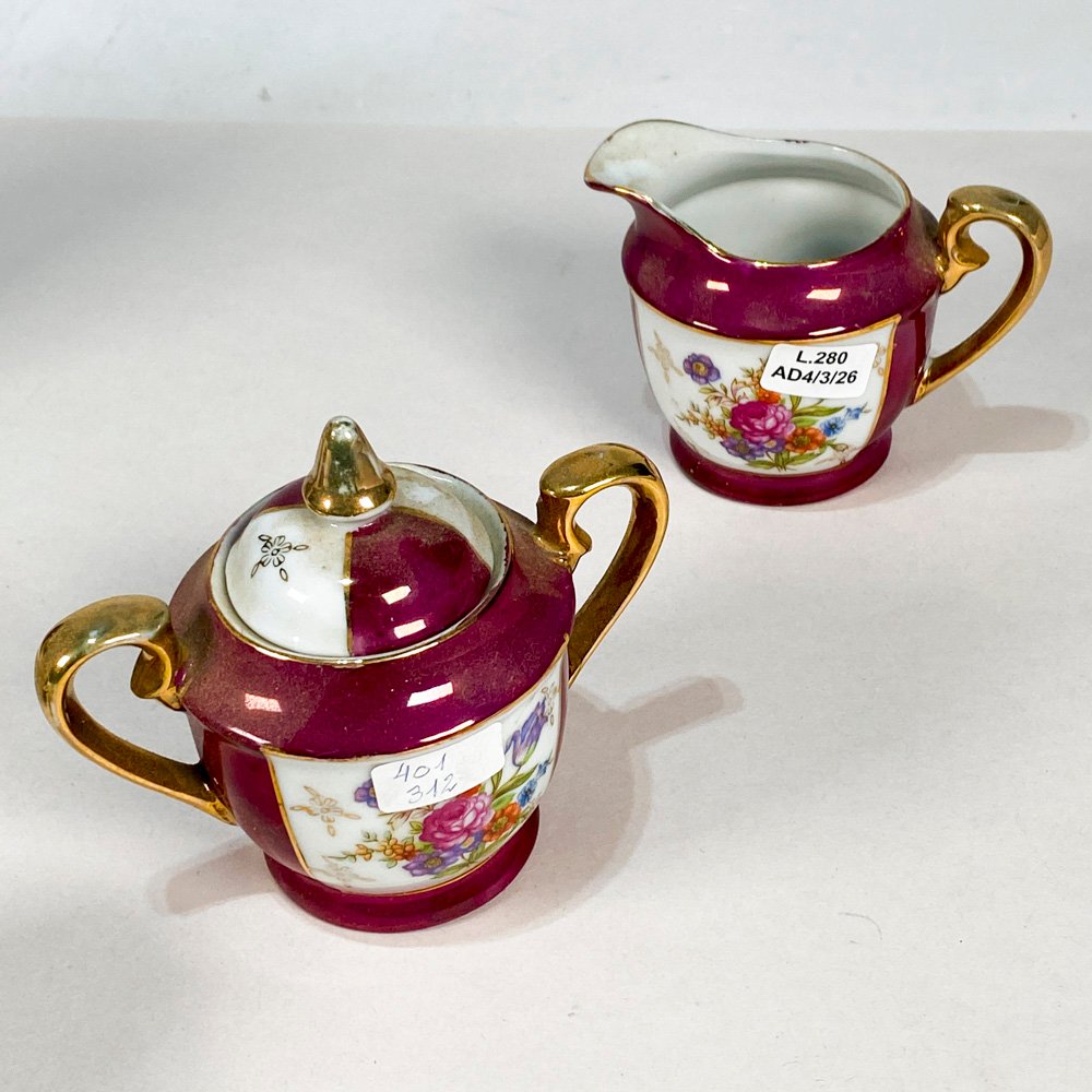 Doce piezas de loza compuesto por platos, tazas y piezas de servir - imagen 2