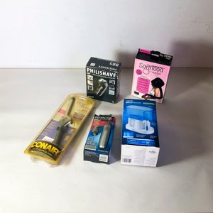Lote siguiente: Set de Cuidado Personal: Secador, Plancha, Depiladora, Afeitadora y Water Flosser