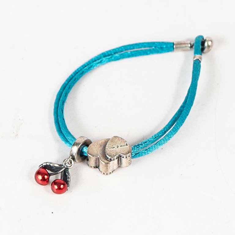 Lote anterior: Pulsera con dijes fantasía