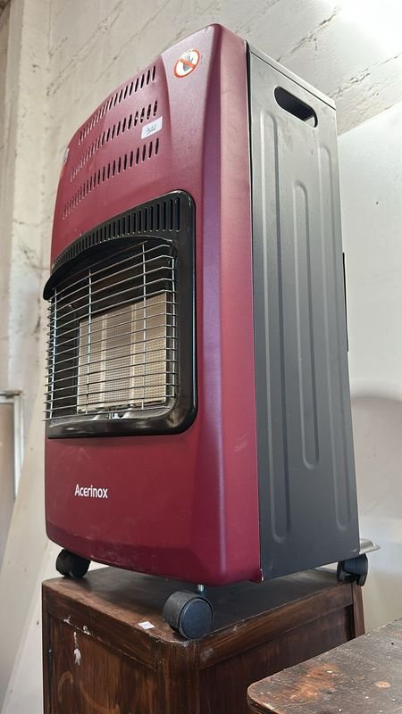 Lote siguiente: Estufa a gas roja para hogar
