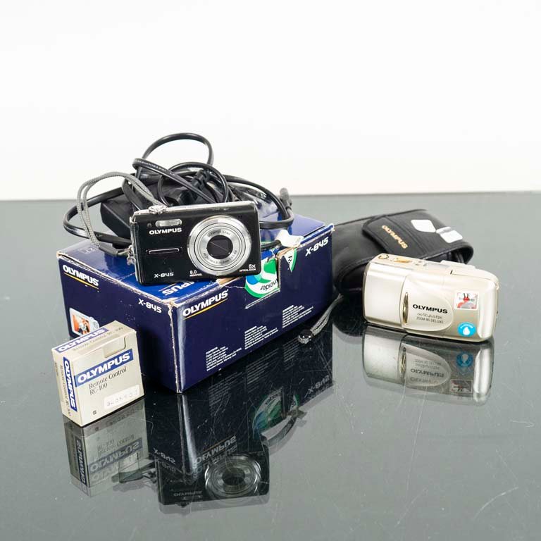 Cámaras y Disparador Remoto Olympus - Equipos Electrónicos