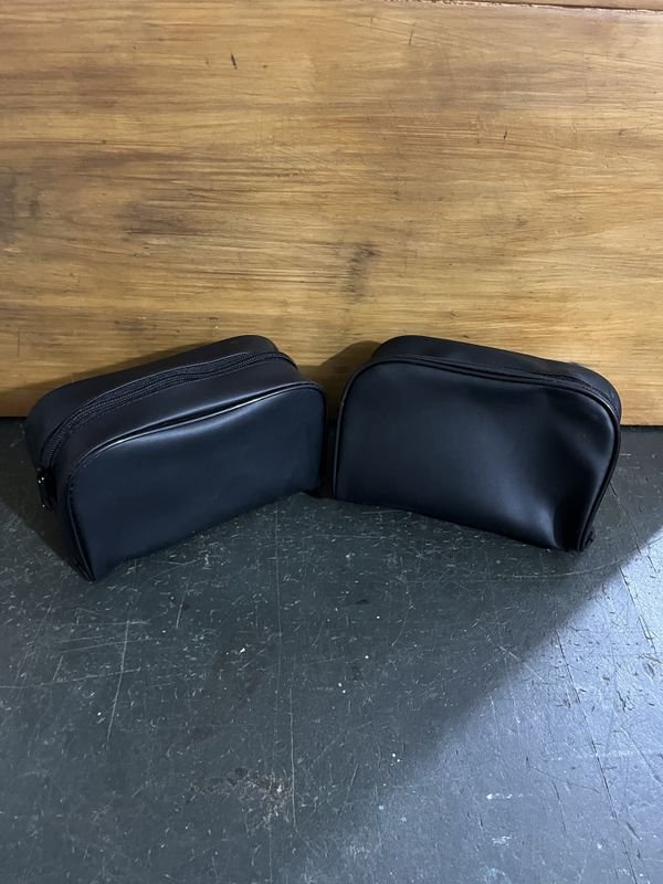 Lote siguiente: Bolsas de cuero negro