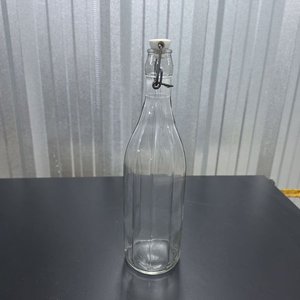 Botella de Vidrio Transparente con Cierre de Bisagra y Relieves Verticales - imagen 2