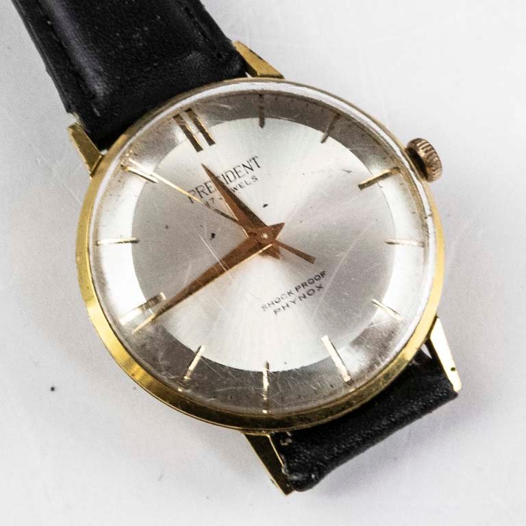 Lote anterior: Reloj President con malla de cuero y tapa rayada
