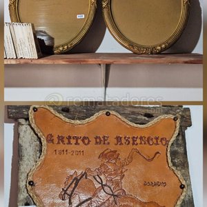 Lote siguiente: Dos Marcos Ovalados Dorados y Cuadro de Cuero "Grito de Asencio"