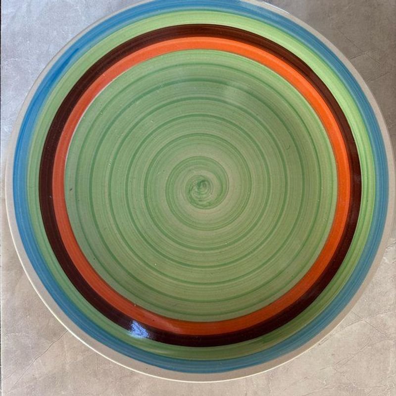 Lote siguiente: Plato de cerámica celeste en venta