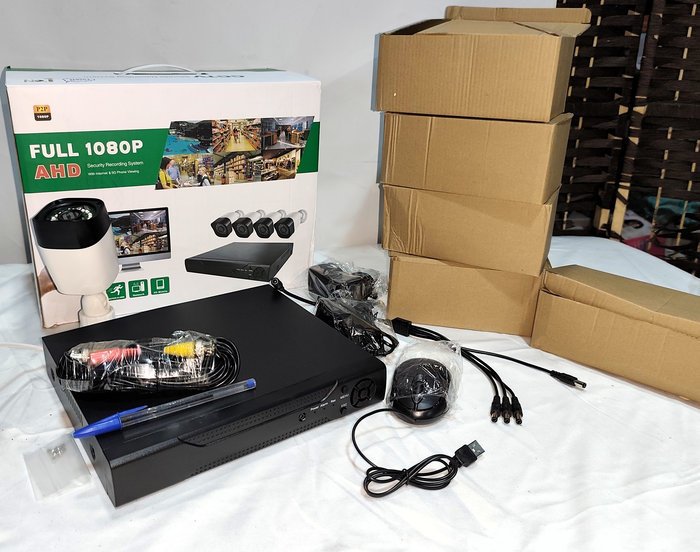Sistema de Vigilancia DVR con 4 Cámaras Full 1080p AHD, Accesorios y Cables