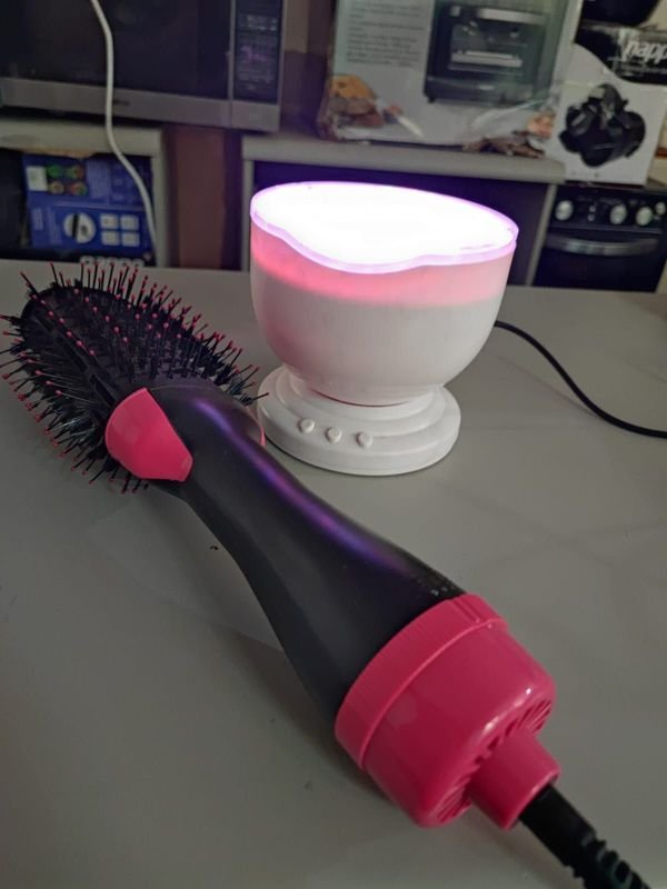 Lámpara y rizador de pelo
