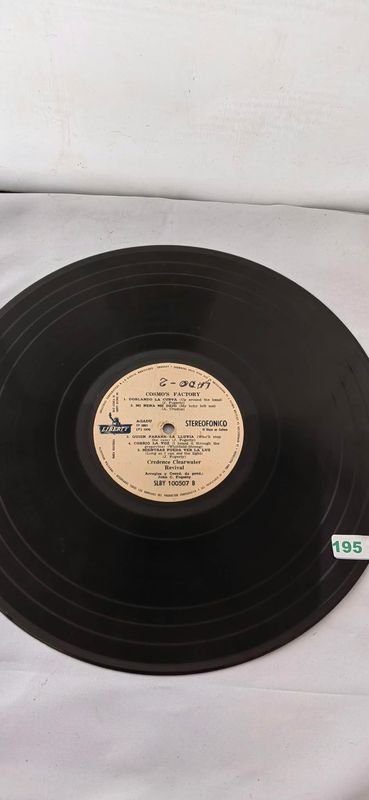 Lote de 2 Discos de Vinilo: Creedence Clearwater Revival y Nelson Riddle