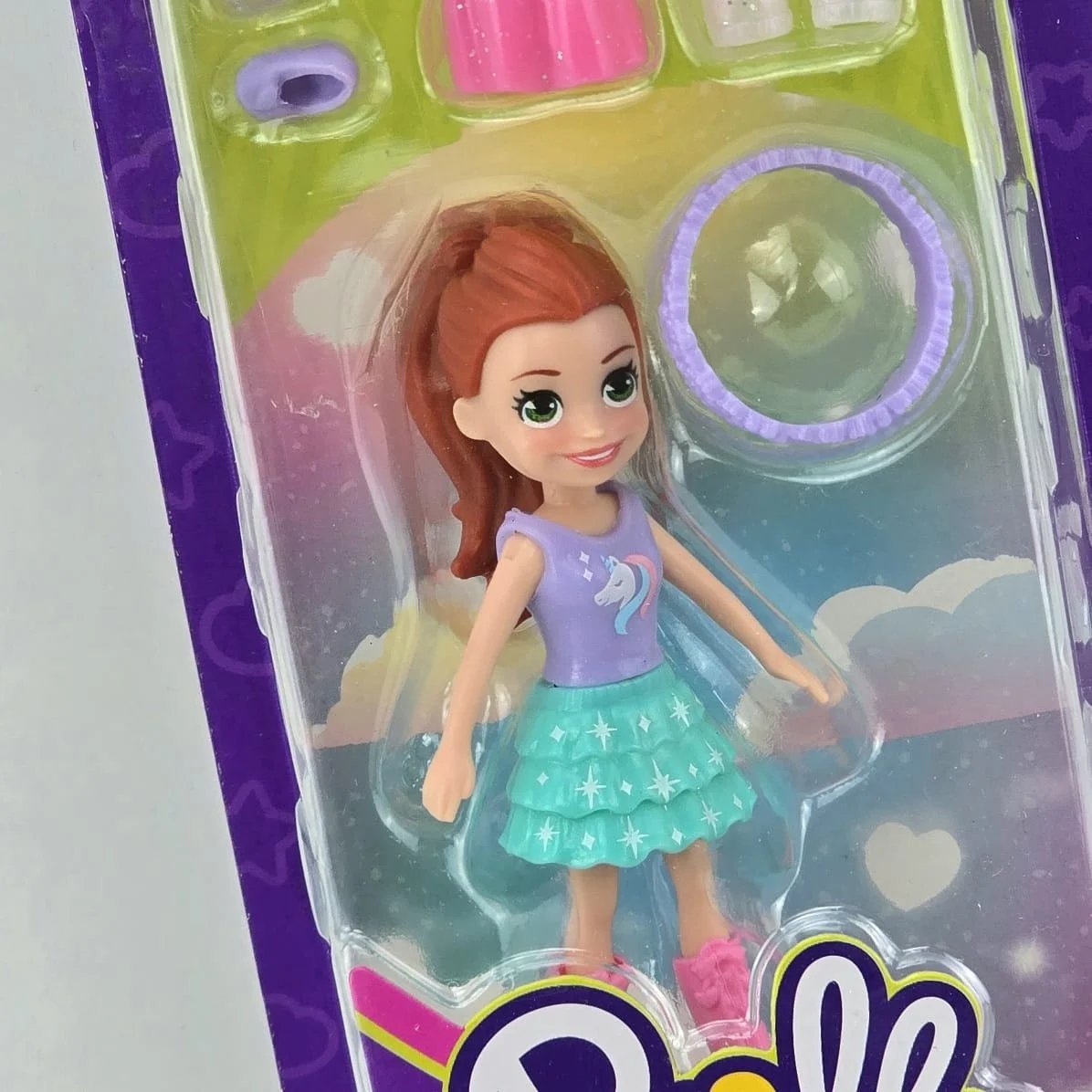 Muñeca Polly Pocket con Ropa y Accesorios