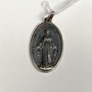 Lote siguiente: Medalla Religiosa Ovalada de Plata
