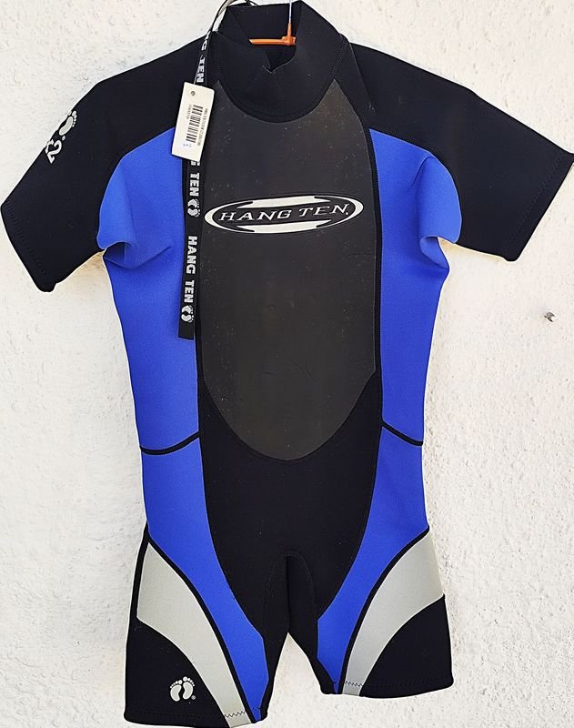 Lote siguiente: Traje de neopreno para niños de talla M de la marca Hang Ten