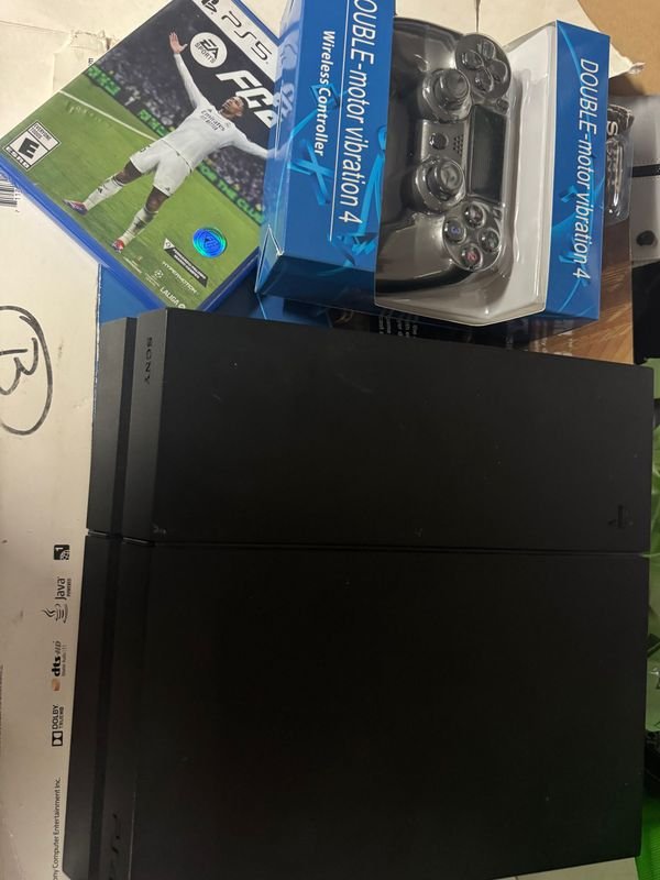 Consola PS4 impecable con garantía y juegos