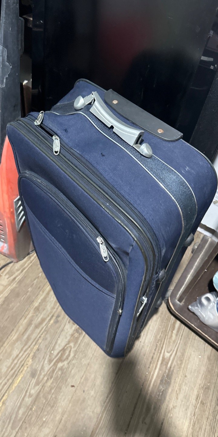 Valija Azul de Viaje con Ruedas y Manija Retráctil