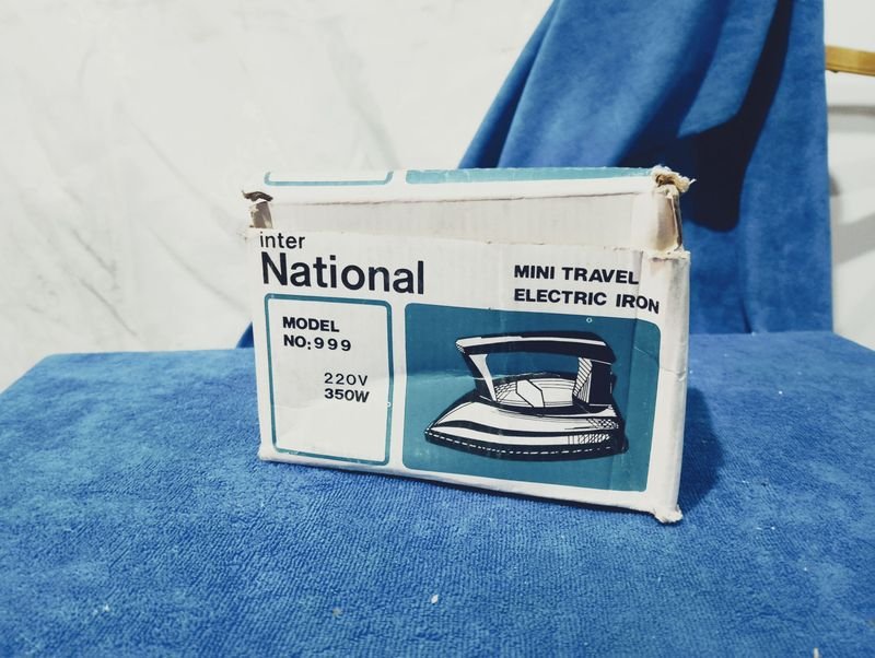 Plancha de viaje Nacional con original y cable - imagen 4