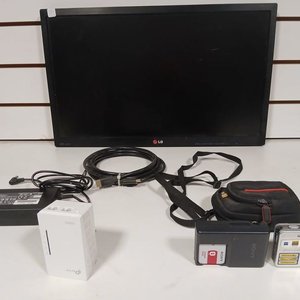 Lote siguiente: Monitor LG, Cámara Sony Cyber-shot y Repetidor TP-Link