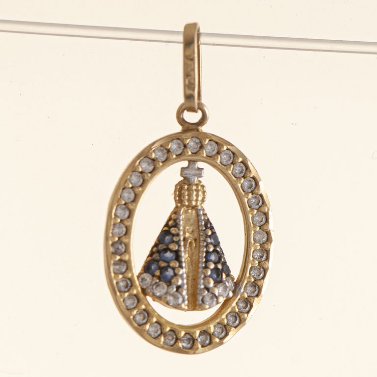 Lote anterior: Colgante oro con piedras y figura Virgen