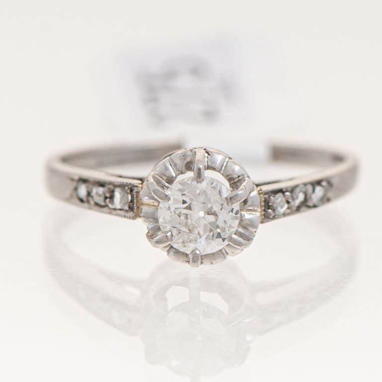 Lote anterior: Solitario oro 18k con brillante y diamantes