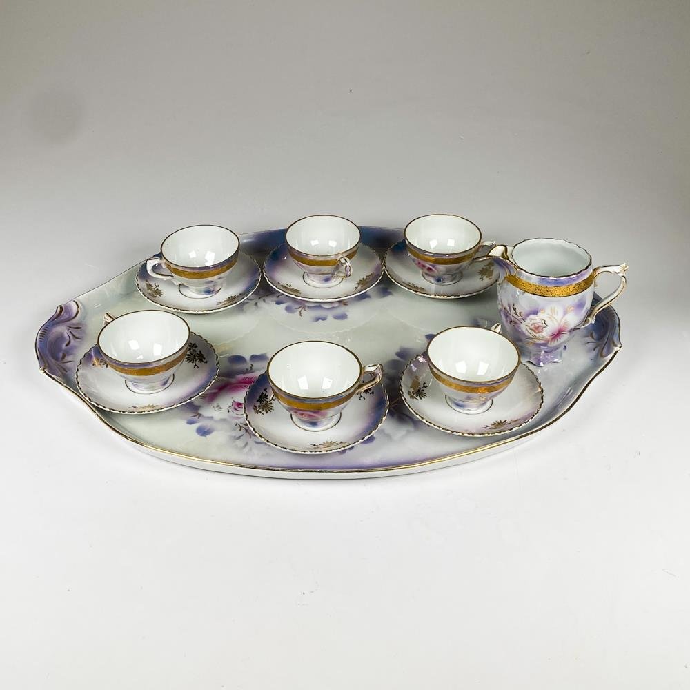 Juego de porcelana para cafe, pocillos, platillos,lechera y bandeja 14 piezas