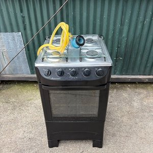 Lote siguiente: Cocina a Gas Negra con Válvula Funcional